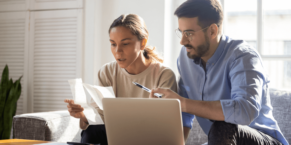 Young couple discussing their finances