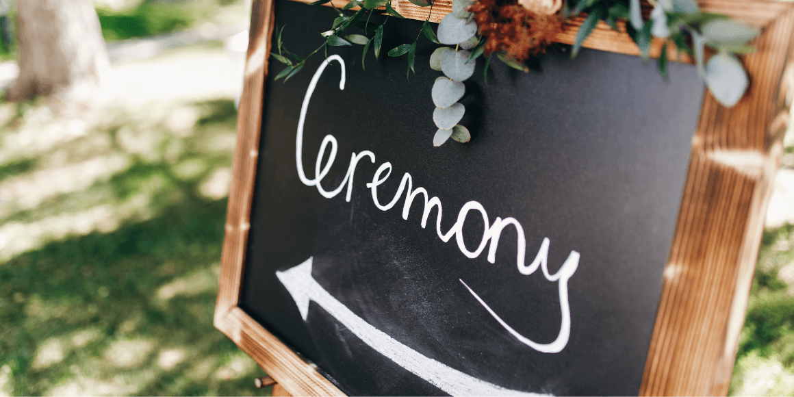 Blackboard ceremony sign placed outside