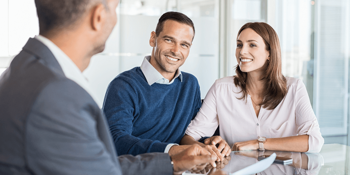 young couple opening an account at a credit union
