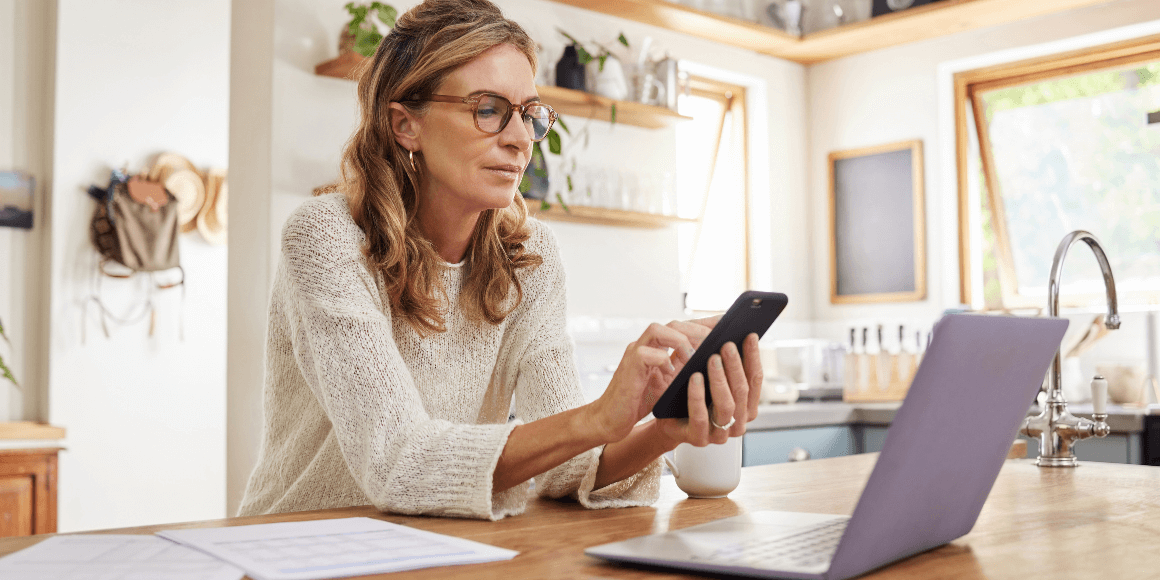 Woman sitting in front of their laptop reviewing their IRA options